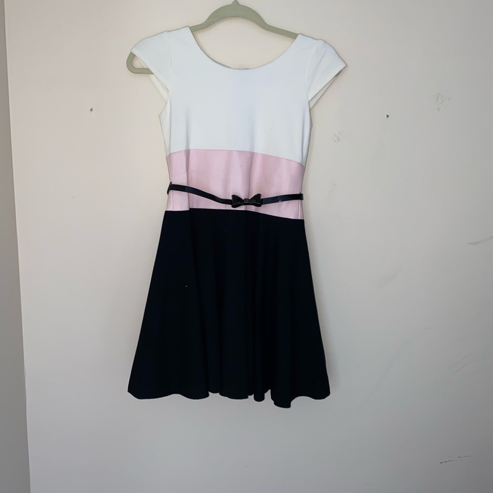 A Zoe Ltd child’s dress in size small.